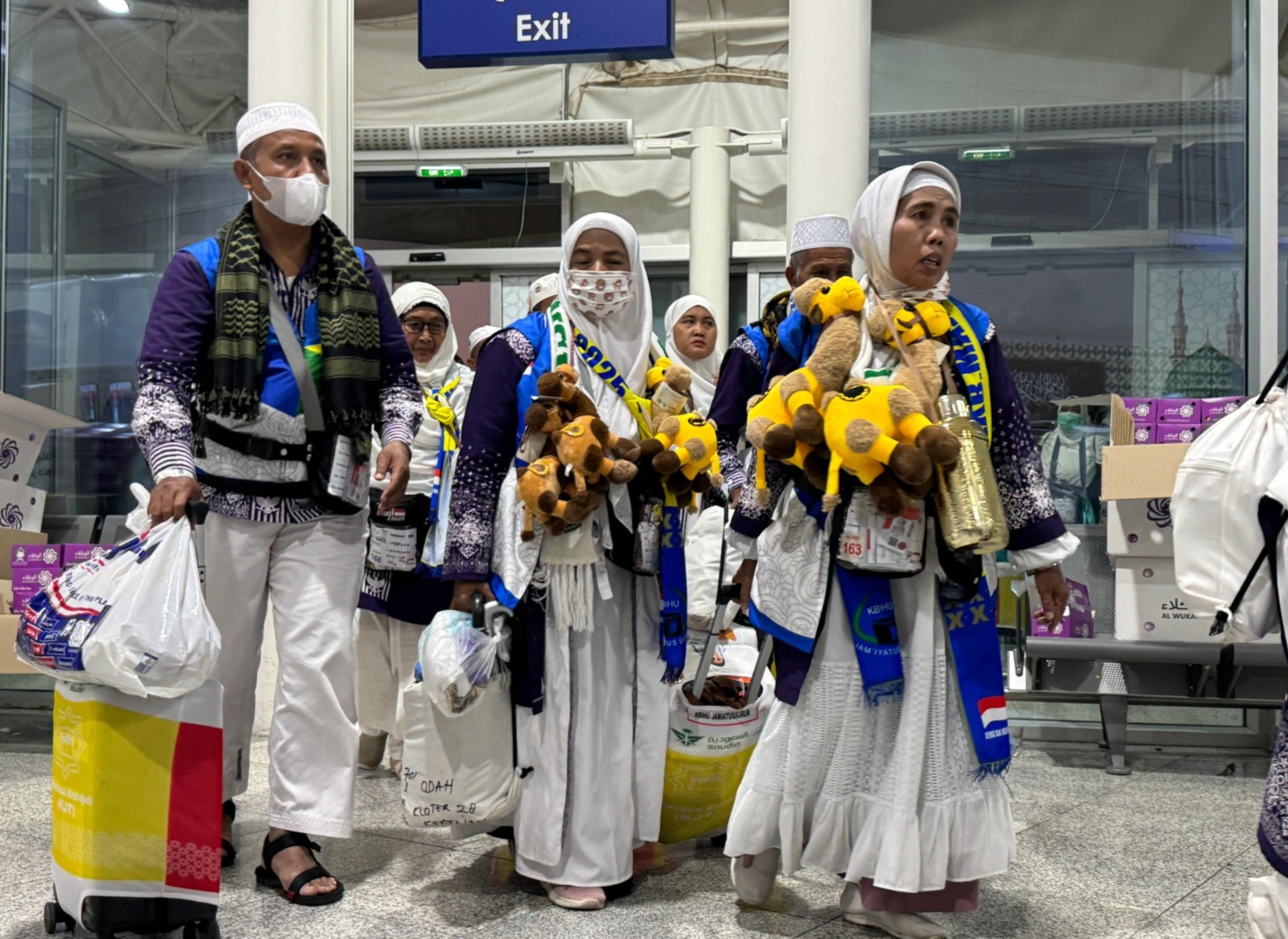 
Jemaah haji pulang ke Indonesia. (Foto: Humas Kemenag)

